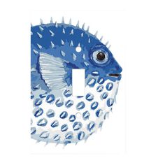 a blue and white fish with spikes on it's head sitting in front of a light switch