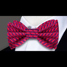 Unleash Your Style with the Red and Blue Geometric Check Silk Bow Tie: A Bold Statement Piece In the world of men's fashion, a bow tie is more than just an accessory—it's a reflection of one's personality and style. Introducing our Red and Blue Geometric Check Silk Bow Tie, a masterpiece that combines boldness with sophistication. With its striking red base adorned with a small geometric check pattern in blue, this bow tie is the perfect accessory to elevate your ensemble and make a stylish stat Classic Red Suit And Tie Accessories, Red Bow Tie For Black Tie Occasions, Red Bow Tie For Formal Occasions, Red Formal Suit And Bow Tie Accessories, Red Adjustable Tie For Formal Occasions, Adjustable Red Ties For Formal Occasions, Classic Adjustable Red Suit And Tie Accessories, Classic Red Bow Tie For Formal Occasions, Red Suit And Tie Accessories For Party