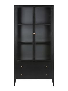 a black bookcase with three drawers and two brass knobs on the bottom shelf