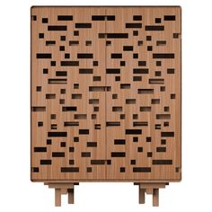 an image of a wooden block with squares on it's sides and two legs