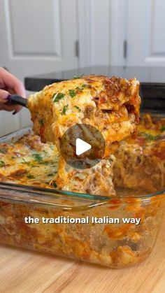 a casserole dish is being lifted with a spatula