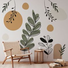 a living room with a chair, rug and wall decals on the walls in different colors