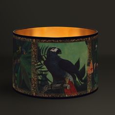 a lamp shade with an image of a parrot on it