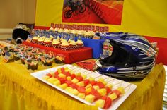 a motorcycle themed birthday party with cupcakes and desserts