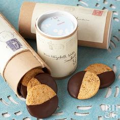 some cookies are sitting on a table next to a cup