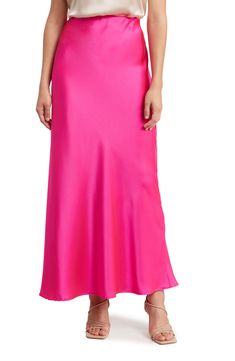 Elevate your wardrobe with this smooth satin skirt cut in an elegant A-line silhouette. 41" length (size Small) 97% polyester, 3% spandex Machine wash, line dry Made in the USA Model stats: 5'10" height, 32" bust, 25" waist, 36" hip. Model is wearing size Small. Elegant Pink Satin Skirt, Pink A-line Bottoms For Party, Pink Satin Skirt For Spring, Formal Pink Satin Bottoms, Pink Silk Evening Skirt, Elegant Pink Satin Bottoms, Pink Satin Evening Bottoms, Elegant Pink Maxi Skirt For Evening, Pink Satin Party Skirt