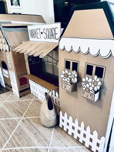 a cardboard house made to look like a market