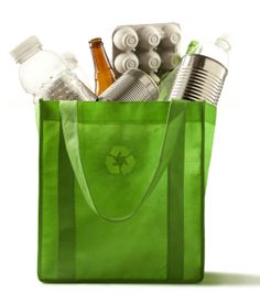 a green shopping bag filled with bottles and cans