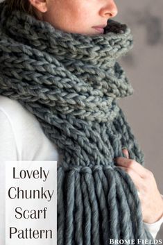 a woman wearing a gray scarf with text overlay that says lovely chunky scarf pattern