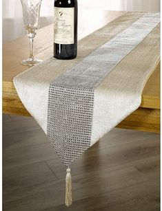 PRICES MAY VARY. 100% Polyester. Coloured table runner with diamante strip. Tassel detail on each end. Size (approx): 185cm x 32cm. Coloured table runner with diamante strip. Tassel detail on each end. Size (approx): 185cm x 32cm. 100% Polyester. Glam Dining Room Decor, Glam Dining Room, Round Marble Dining Table, Patchwork Table Runner, Sequin Table Runner, Table Runner Size, Quilted Table Runners Patterns, Christmas Wrap, European Home Decor