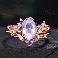 ● You will get high quality hand-made crafted jewelry when you purchase items on DRingstudio. Admire the stunning hues of lavender and violet, each Amethyst ring exudes charming elegance and offers a gateway to inner calmness, providing a sanctuary from the hustle and bustle of everyday life and keeping the wearer intoxicated. This exquisite Amethyst ring is believed to bestow fortune, blessings, and wealth, making it an ideal gift for your loved ones, family and friends. ● Gems Info: Main stone: 6x8mm Oval natural Lavender Amethyst Ring Side stones: Opal Matching band stones: Amethyst This ring can be customized by other gems stones, please contact us directly if you need :) ● Warranty 100 days warranty policy.  I always take responsibility for my customers. Even your order more than 100 Opal Wedding Ring, Rose Gold Leaf, Amethyst Engagement Ring, Vintage Lavender, Lavender Amethyst, Amethyst Ring Engagement, Ring Proposal, Opal Wedding, Opal Wedding Rings