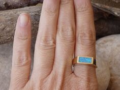 Rectangle Opal Ring, Gold Fire Opal Signet Ring, Blue Opal Signet Ring, Blue Gemstone Ring, Opal Goldfilled Ring, Men Women Gold Signet Ring Unisex 14K Gold Filled rectangle blue opal signet ring, beautiful unique ring for men or women. Metal: 14K Gold Filled Gemstone: lab opal Size: All US Sizes Stone Size: 13mm x 5mm The ring will be packed in a gift box. FOR MY SIGNET RINGS: https://www.etsy.com/il-en/shop/rebekajewelry/search?search_query=signet&order=date_desc&view_type=gallery& Champagne Earrings, Blue Gemstone Ring, Cream Earrings, Blue Opal Ring, Ear Crawler Earrings, Blue Gemstone Rings, Ring Opal, Fire Opal Ring, Opal Ring Gold