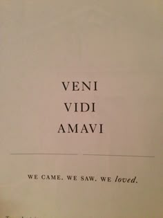 an old book with the words veni vidi amavi written in black ink