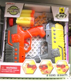 an assortment of toys in a box for sale on the shelf at a toy store