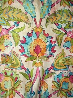 the fabric is very colorful and has many flowers on it's back end,