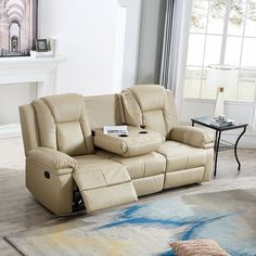 a living room scene with focus on the reclining sofa