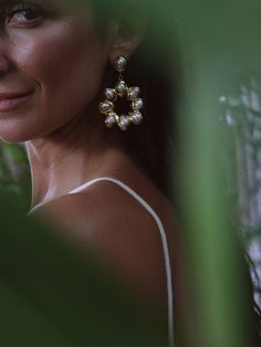 Introducing our Pearl Bloom Earrings, crafted from genuine pearl and 18k gold plating, designed to captivate both elegance and charm. Inspired by the ethereal beauty of a blooming flower, these statement earrings are bound to enhance your overall style and leave everyone in awe. Each earring showcases a delicate circle motif, resembling the enchanting petals of a blossoming flower.  Drop part of the earring is between 40-50mm, and with top stud part of earring they are approximately 65mm long. Blossoming Flower, Statement Earrings Wedding, Flamingo Earrings, Wedding Bride Jewelry, Bride Jewelry, Gift For Woman, Earrings Wedding, Ethereal Beauty, Bride Jewellery