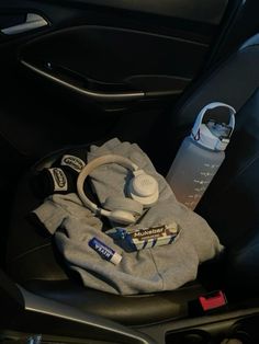 the contents of a car seat are neatly packed and ready to be taken home from work