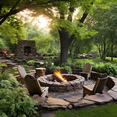 an outdoor fire pit surrounded by chairs and trees