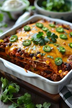 a casserole dish filled with mexican food