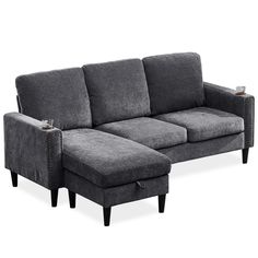 a gray couch with a chaise lounger on it's back and footrests