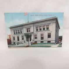 an old postcard depicting the public library building in pasadena, california is displayed on a white background