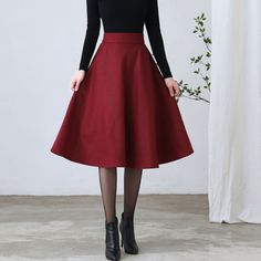 "★★ FEATURES * Wool skirt * Polyester lining * Two side pockets * Right zipper closure * back little elastic waistband * A Line wool Skirt * Midi wool sirt * Perfect for Winter, autumn * Dry clean ★★ The model is 170 cm (5′ 7″) tall with a 80 cm (31.5\") bust, 66 cm (26\") waist. She is wearing the burgundy wool skirt in size XS. ★★ Please select custom order according to the follow situation Your height is not between 155 cm- 175 cm Your weight is over 75 kg Request the length Reequest other co Winter A-line Solid Color Bottoms, Winter A-line Bottoms In Solid Color, Solid Long Pencil Skirt For Fall, Winter Solid Color Mini Skirt, Red Pleated Skirt For Fall, Red Long Skirt For Fall, Classic Red Bottoms For Winter, Classic Red Winter Bottoms, Winter Solid Color Flared Skirt