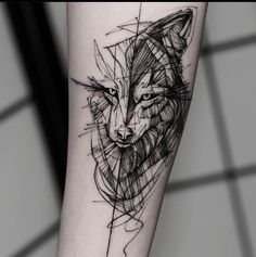 a black and white photo of a fox tattoo on the left arm with lines coming out of it