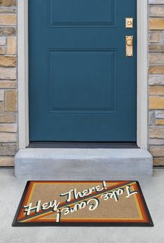 a door mat that says, there's hope for god on it in front of a blue door