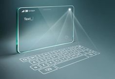 an image of a glass tablet with keyboard on the screen and light coming from it