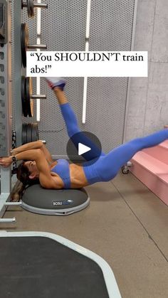 a woman is doing an exercise on a bench