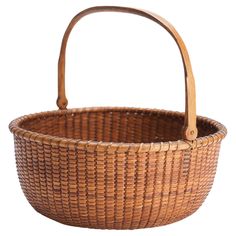 a wicker basket is shown on a white background with clipping for the handle