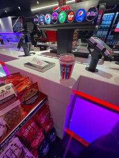 a table topped with lots of different types of food and drinks on top of it