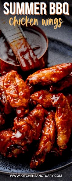 barbecue chicken wings with bbq sauce in the background and text overlay that reads, summer bbq chicken wings