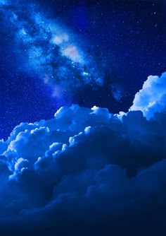 the night sky is filled with clouds and stars