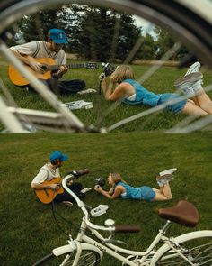 two people sitting in the grass playing guitar and another person laying down on the ground