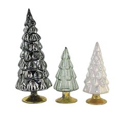 three glass christmas trees sitting next to each other