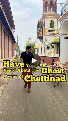 a man is walking down the street in front of some buildings with words that read have you ever heard about the ghost towns of cheetinad