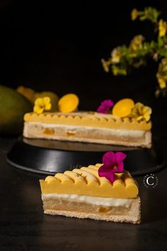 two slices of cake on a plate with flowers