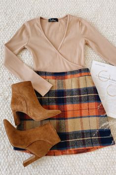 Say hello to a cute outfit! Lulus Mad for Plaid Beige Plaid Mini Skirt is the perfect piece to keep you in style through fall and winter. The perfect plaid print in rust orange, navy blue, and beige form an a-line mini skirt. that pairs perfectly with a simple top and boots. #lovelulus Cute Fall Outfits, Outfit Inspo Fall, Fall Fashion Trends, Fall Fashion Outfits, On The Floor, Looks Vintage, Fall Winter Outfits, The Floor, Cute Casual Outfits