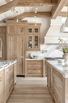 a kitchen with wooden cabinets and white counter tops