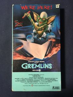 an old vhs cover for the movie gremlin's origamig