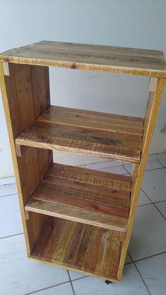 a wooden shelf sitting on top of a tiled floor