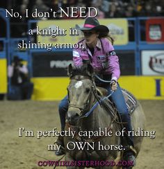 a woman riding on the back of a brown horse in an arena at a rodeo