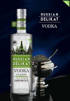 a bottle of vodka next to a cup and spoon