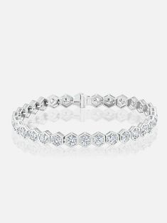 7" length. Platinum and 3.9mm round diamond tennis bracelet. Our signature tennis bracelet – one stunning row of hexagon bezel-set stones – is set with dazzling diamonds. Inquire for accurate pricing and diamond quality options. Made to order. The current lead time is 8-10 weeks. Eternity Bracelet, Graff Diamonds, Diamond Tennis Bracelet, Tennis Bracelet Diamond, Diamond Bracelets, Tennis Bracelet, Lead Time, Bracelet Patterns, Bezel Setting