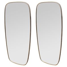 two mirrors are shown side by side on a white background, one is gold and the other is silver