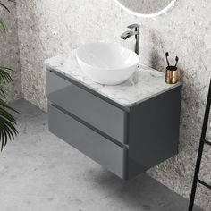 a bathroom vanity with a sink and mirror