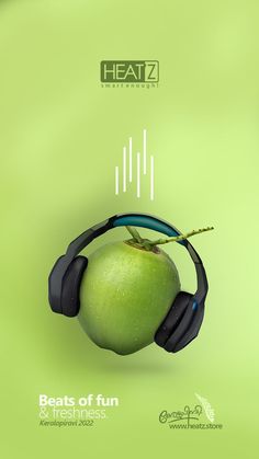 an apple with headphones on top of it