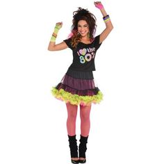 a woman in a costume is posing with her hands up to the air and smiling